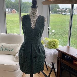 NWOT size 6 green and black dress with pockets.